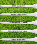 Custom Wooden Golf Tees Two And Three Quarters Inches Long Personalize With Your Name Or Text In Bulk Packs On Grass