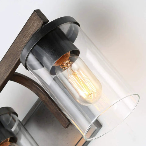 Close-up of bulb and clear glass shade on Rustic Faux Wood Three Light Farmhouse Vanity Light With Distressed Black Backing