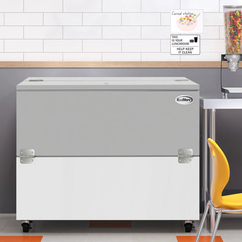 Built Like A Tank Heavy Duty Commercial Milk Cooler Refrigerator For Schools And Cafeterias With Smooth Heavy Duty Casters 12 Crate Stainless Steel Beverage Chiller Etl Certified Solid Service Ready Storage in a cafeteria setting.