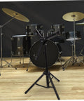 Flat Out Killer Heavy Duty Alloy Drum Rack Featuring A Folding Snare Stand And Fully Adjustable Tripod Shelf in matte black, positioned in front of a drum kit.