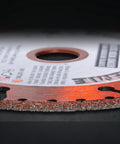 Close-up of Extreme 4.5 Inch Cut Off Wheel 3 Pack for Metal Cutting, showcasing vacuum brazed industrial diamond grit edge.