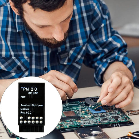 Technician integrating TPM 2.0 Security Module With 12 Pin LPC Interface into motherboard for secure boot and data encryption.
