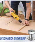 Person using a drill on a wooden surface with Straight Up Durable Chicago Screws And Leather Rivet Sets With Stainless Steel Bolt Studs.