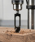 Five Piece High Carbon Steel Wood Plug Cutter Set Offering 3/8 To 1 Inch Bits For Smooth Dowel Plugging and No Nonsense Woodworking Gear That Gets It Done Right in action drilling into wood.