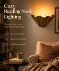 QUOLM Vintage Bronze Wall Sconce, Scalloped Uplight Wall Lamp, E26 with ruffle shade in cozy reading nook.