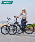 Dolphin 26 Inch Step Through Electric Bike For Adults, 350W Peak Motor With 20 MPH Top Speed, Removable 280Wh Battery, 15 To 30 Mile Range With Pedal Assist, Perfect For City Hops And Weekend Cruising, woman standing with two bikes