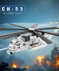 Epic Military Helicopter Building Set 33037 Transformable CH 53 Style Model Kit shown flying over battle scene.