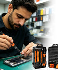 The Ultimate 115 In 1 Magnetic Precision Screwdriver Tool Kit For Electronics Repair With Torx Bits Flexible Shaft Driver Set Perfect Gifts for Guys Fixing Laptops Phones MacBooks PS5 Xbox Gaming Consoles Smartwatches And Eyewear. Man repairing smartphone with orange magnetic precision screwdriver kit