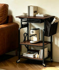 Slick Rolling Three Tier Coffee Station Cart With Built In Power Panel And Roomy Storage Shelf For Mastering Your Daily Grind And Charging Tech Without Hassle, featuring espresso machine and books.