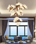 Tree Branch Ceiling Pendant Light Straight Up Fresh Statement Chandelier Top Shelf Adjustable Hanging Lamp in a modern living room.