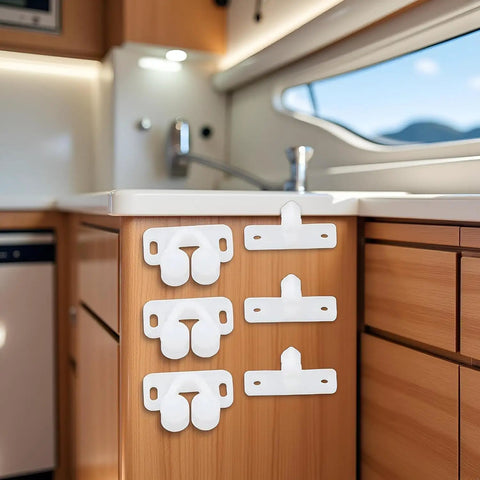 Super Secure 4 Pack White Marine Boat Ball Catch Roller Latch Spring Back Plates For Cabinet Doors And Cupboards Durable Plastic Hardware That Fits Anywhere mounted on a wooden cabinet.