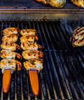 Grilled shrimp skewers and vegetables on stainless steel grid for gas grills. Starter Kit With Natural Sugar Maple Charcoal Chips
