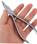 Hand holding Stainless Steel Eyeglasses Repair Tool With Angled Pliers For Adjusting Frames Quick And Easy Eyewear Fixes.