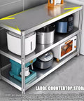 Heavy Duty Stainless Steel Shelving Unit Badass Three Shelf Storage Rack For Kitchen Garage And Commercial Office with kitchen appliances.