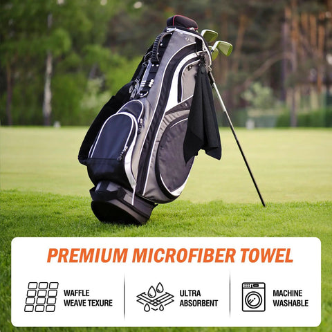 Magnetic Golf Towel 23.6x15.7 Inches Large Dual-Sided Microfiber And Scrub Towel With Waffle Weave attached to golf bag on green