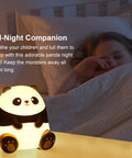 Panda Night Light For Kids With Cozy LED Glow Timer Auto Shutoff Battery Operated Silicone Animal Night Light For Nursery Baby Bedroom Decor Cute Kawaii Gift For Toddlers Boys Girls Teens beside a sleeping child in bed