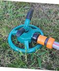 Automatic Rotary Lawn Sprinkler With Stable Base for backyard and lawn irrigation on grass
