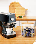 Clear Coffee Pod Holder With Bamboo Lid 80 Ounce K Cup Organizer on kitchen countertop next to coffee machine