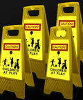 Four Pack 24 Inch Slow Down Kids At Play Sign Reflective Double Sided Street Safety Signs With Portable Handles For Neighborhoods