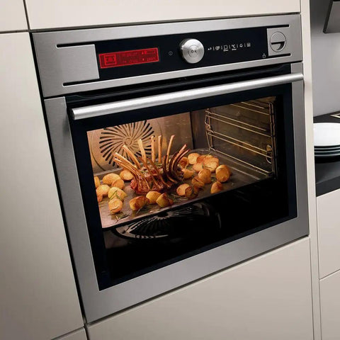 Modern oven illuminated by 40 Watt High Temp Appliance Oven Light Bulb 120V Clear Glass 415 Lumens E26 E27 Brass Base G45 4 Pack for Microwaves.