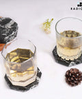 Slick Black Star Marble Coasters Set Of Six Natural Polished Stone Drink Guards For Coffee And Dining Tables with glasses