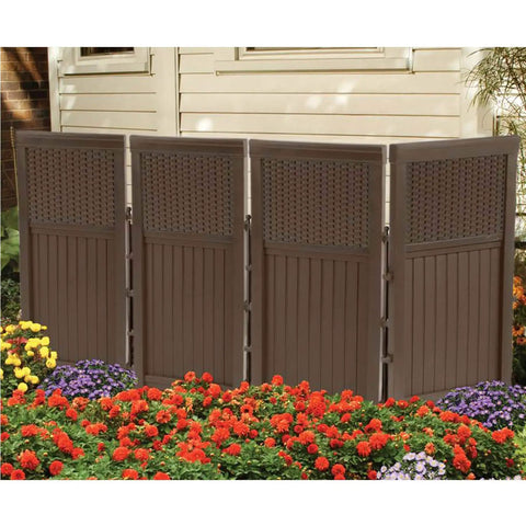 Four Panel Freestanding Wicker Resin Outdoor Screen Enclosure In Brown, Reversible Panels, 23 Inch Wide By 44 Inch High Garden Privacy Screen For Hiding Air Conditioning Units, Trash Cans, Pool Equipment And Outdoor Spaces installed in garden.
