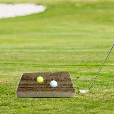 Golf Bunker Practice Mat With Realistic Sand Pit Feel Outdoor Training Accessory For Adults Includes Bunker Brush next to two golf balls