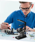 Usb Soldering Station With Led Magnifying Lamp And Adjustable Third Hand Clamp For Electronics Repair in use on workbench