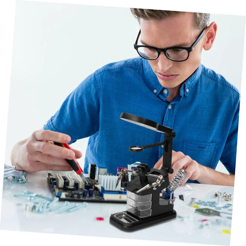 Usb Soldering Station With Led Magnifying Lamp And Adjustable Third Hand Clamp For Electronics Repair in use on workbench