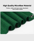 Green microfiber towel close-up from Golf Towel Set Of 3 16x16 Waffle Microfiber Towels With Carabiners And Hooks Includes Club Range Card And Gift Box Must Have Golf Accessories For Men And Women Great Gift For Golfers.