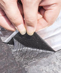 Heavy Duty Roof Repair Tape With Aluminum Foil, Polymer Modified Asphalt Sealant being applied to a roof surface.