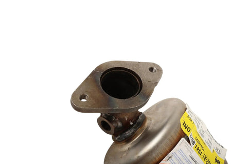 Close-up of GM Genuine Parts Three Way Catalytic Converter Kit With Exhaust Pipe Direct Replacement For Cars And Trucks Engineered To OE Specs