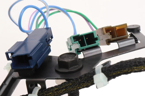 Close-up of GM Automatic Transmission Wiring Harness Kit for Cars and Trucks with color-coded connectors on metal bracket.