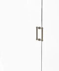 Back-To-Back Shower Door Pull With Twisted Accent In Antique Pewter Finish, 8-Inch Handle on glass shower door, solid brass construction.