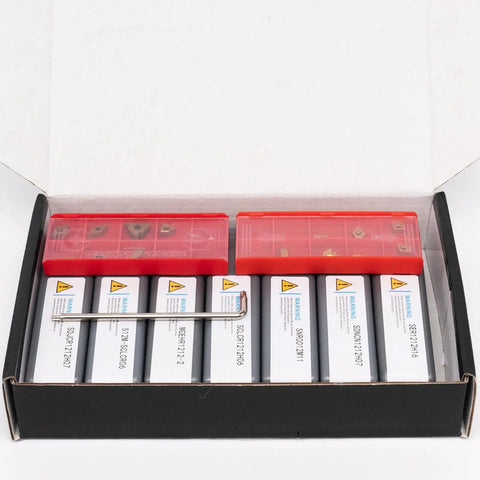 Open box displaying Pro Grade Lathe Turning Tool Kit With Half Inch Shank, 7 holders and 14 carbide inserts, black oxide finish.