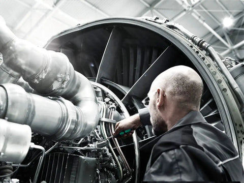 Technician using Hex Driver 2.5mm Kraftform Plus Hex Plus Screwdriver with ergonomic handle in aircraft engine repair