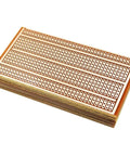 Stack of 12 copper stripboards, 50x100mm, single-sided perfboard for electronics, 2.54mm pitch, part of 50x100mm Copper Stripboards 12 Pack