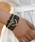 Killer Boho Western Leather Wrap Bracelet For Women With Layered Cuff Strands Heart Stone Charm stylishly worn on wrist.