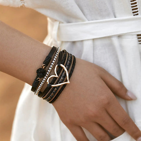 Killer Boho Western Leather Wrap Bracelet For Women With Layered Cuff Strands Heart Stone Charm stylishly worn on wrist.