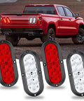 Beefy 6 Inch Oval LED Trailer Tail Light Kit 4 Lights Surface Mount 2R2W IP67DOT showcasing red and white lights on a truck