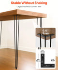 Wooden table with Hairpin Table Legs 34 Inch Black Set Of 4 Beefy Heavy Duty Desk Legs, detail on corner attachment, on hardwood floor.