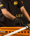 Person using Light Duty 10 Inch Mini Hacksaw with One Handed Grip and Thumb Rest Ergonomic Handle in workshop