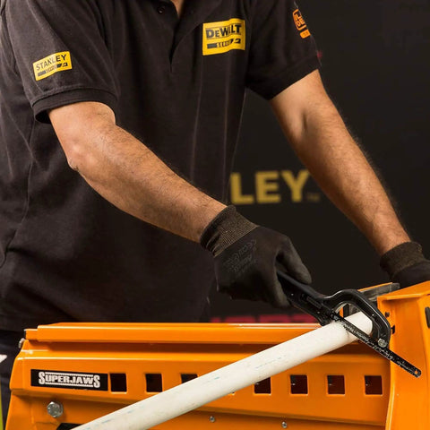 Person using Light Duty 10 Inch Mini Hacksaw with One Handed Grip and Thumb Rest Ergonomic Handle in workshop