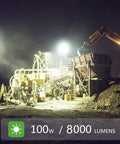 Beast Mode Bright Rechargeable Portable LED Work Light With Stand illuminating a construction site at night, 100W, 8000 lumens