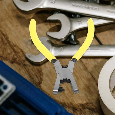 Heavy Duty One Hole Puncher Plier For DIY And Office Use 2mm Metal Paper Punch Tool with yellow handles on a workbench