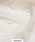 Close-up of rod pocket beige outdoor sheer curtain with water droplets, highlighting weatherproof design for patio and porch.
