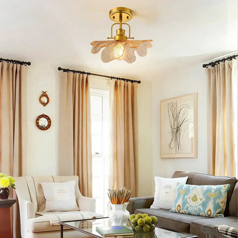 Modern Brass Ceiling Pendant Light With Green Glass Flower Shade Gold Ceiling Lamp For Bedroom Living Room Dining Room And Hallway E26 110V Semi Flush Mount Chic Boss Home Lighting That's Straight Up Lit, in a living room setting.