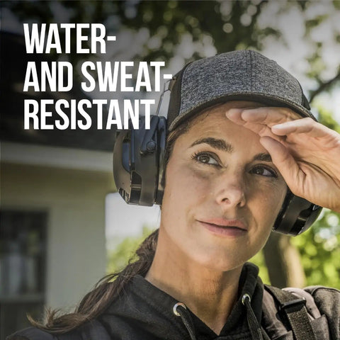 Person wearing WorkTunes Connect Solar Wireless Hearing Protector With Bluetooth, 26 dB NRR, Solar Charging for outdoor use.