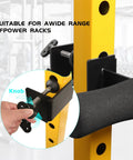Close-up of Heavy Duty Hamstring Curl Squat Rack Attachment, showing steel knob and padded comfort on power rack.