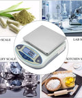 Pro Grade Digital Precision Balance 5000g By 0.01g Lab Scale For Jewelry Kitchen Science And Industrial Use With Stainless Steel Pan And Corrosion Resistant ABS Housing